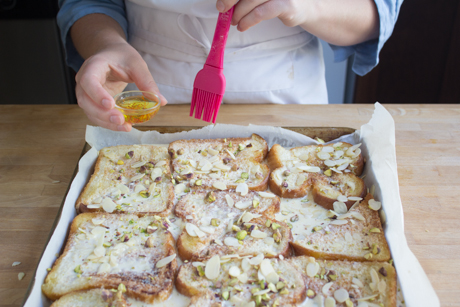 Sprinkle rose water, saffron mixture over bread