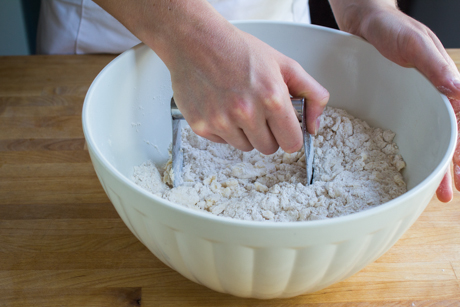 Use a pastry cutter to cut the butter into the dry ingredients