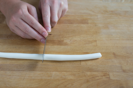 1. Roll fondant into a long medium-think line and cut into one inch pieces.