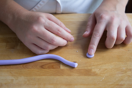 5. Roll into a ball and using one finger flatten the top of the ball. 