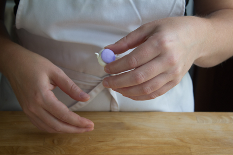 10. Dip the flat end of the spout into a tiny bit of water and attach to the other side of the teapot. 