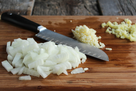 3. While pumpkin is roasting chop onion, ginger, and garlic.