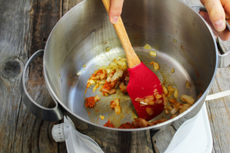 5. Add the red curry paste to the onions and cook for another 2 minutes. 