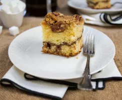 Chocolate Cinnamon Swirl Sour Cream Coffee Cake on a white plate