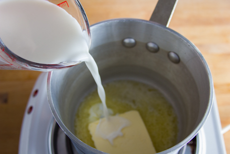 2. Add milk to melted butter