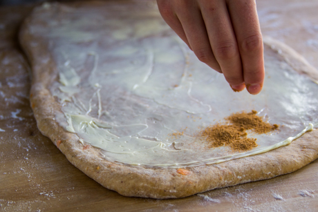 26. Sprinkle filling over buttered dough